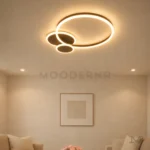 Trueno Black instalada en sala, aportando iluminación cálida y diseño moderno al ambiente.