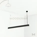 Ofelia Black en fondo blanco, destacando su diseño lineal moderno en color negro ideal para iluminación sobre mesas o islas.