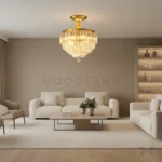 Pauline Gold Crystal instalada en sala, aportando brillo y presencia decorativa al espacio.