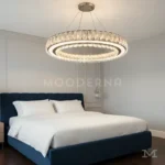 Nuria Platinum Crystal en sala, creando un ambiente moderno y refinado.