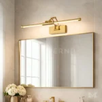 Floris Gold recargable instalada en baño, ideal para espejos o iluminación puntual sin cables.
