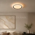 Luminaria LED circular negra Annika Black instalada en techo de sala moderna