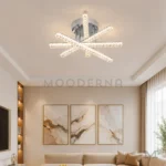 Luminaria LED Viktoria Platinum instalada en techo de sala moderna con sofá beige