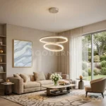 Lámpara LED Billy Platinum de dos aros suspendidos en un comedor integrado a una sala moderna.