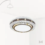 Luminaria LED moderna Leandra con anillos decorativos tipo cristal y centro circular blanco